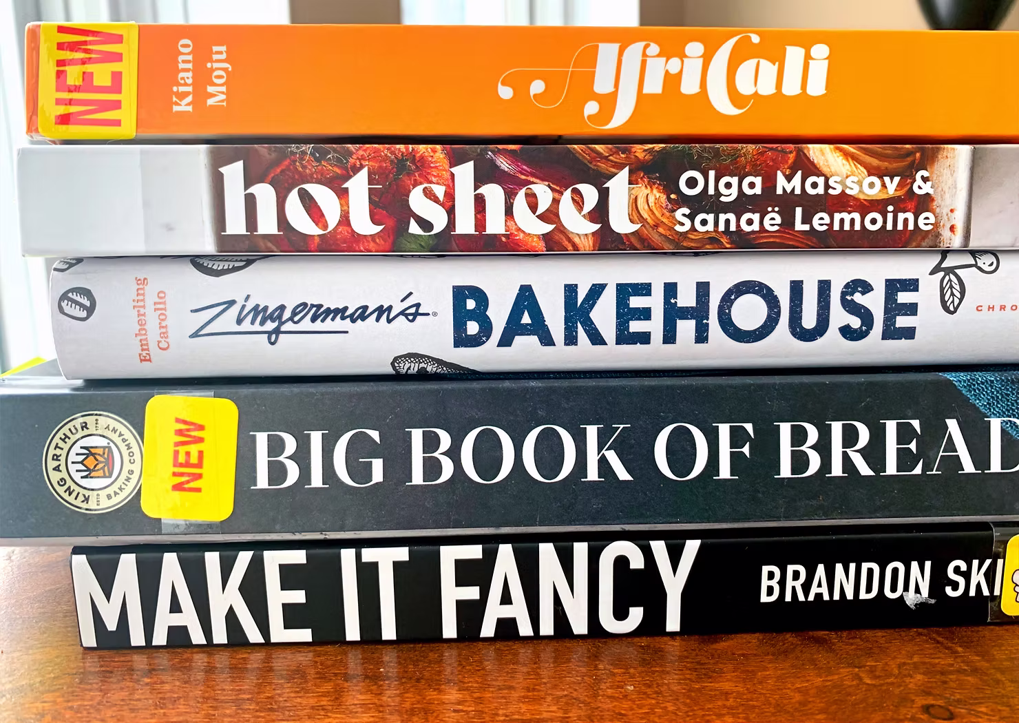 5 books stacked "AfriCali" "Hot Sheet" "Bakehouse" "Big Book of Bread "Make It Fancy"