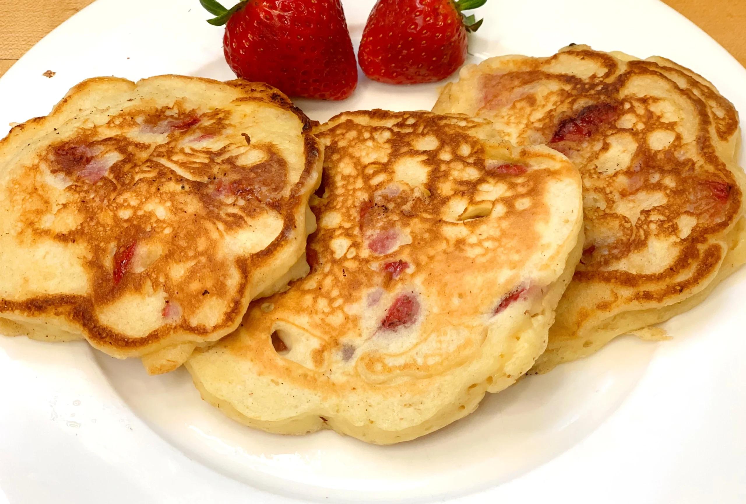 Strawberry pancakes plated