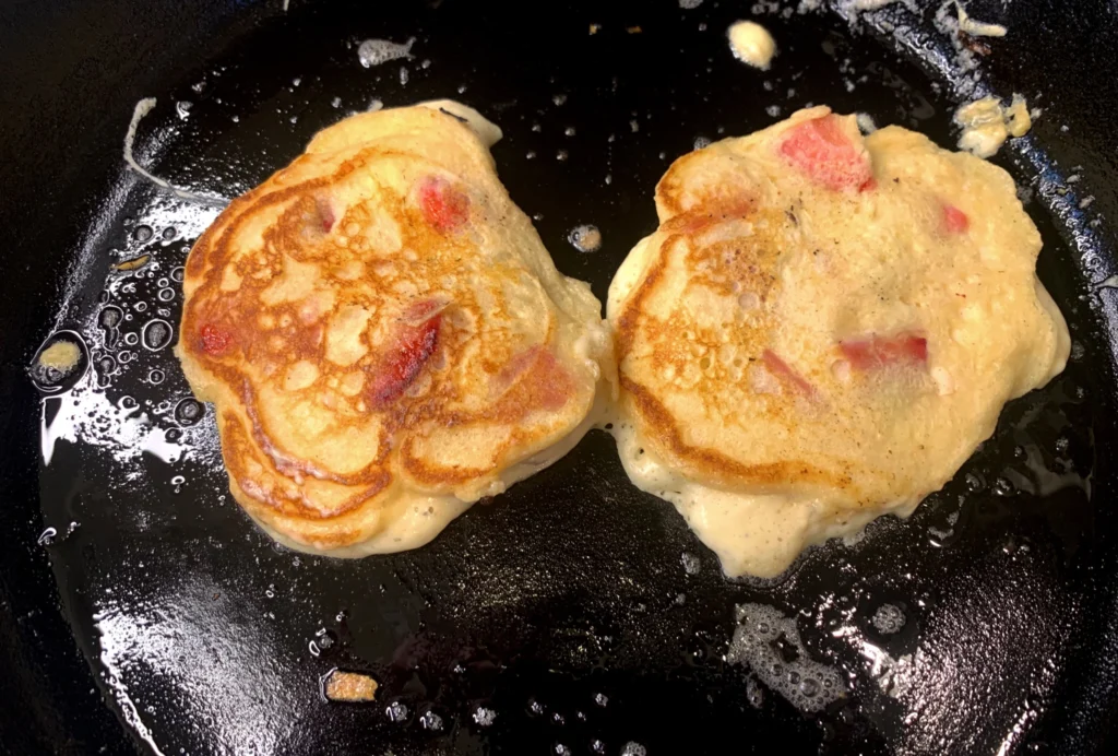 Strawberry pancakes cooking