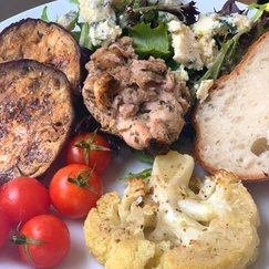 Lemon chicken plated with sides