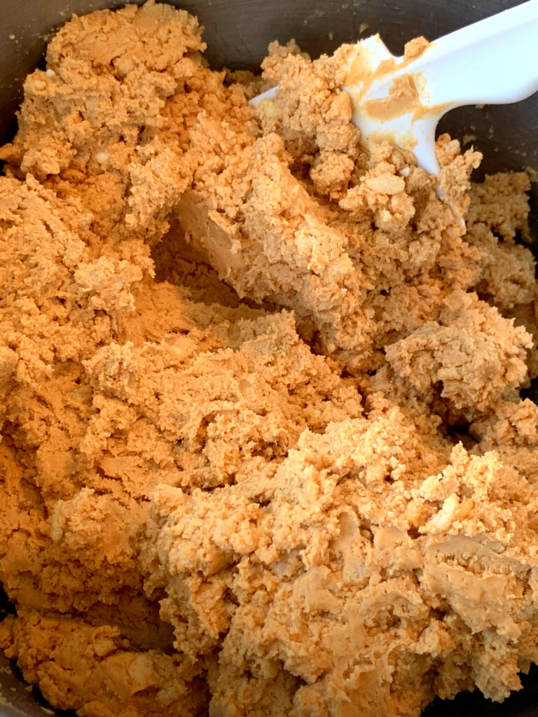 peanut butter dough in mixer bowl